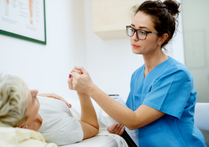 nurse with patient-blog Nurse with patient